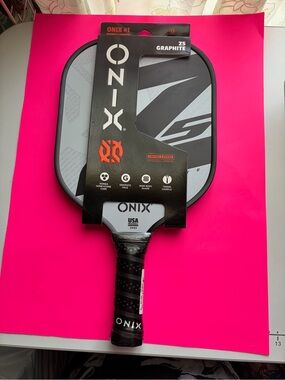 Onix Graphite Z5 Pickleball Paddle in Black and Gray with Orange Logo